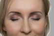 Face of beautiful woman with nude makeup. Detail view of woman with closed eyes and natural makeup.