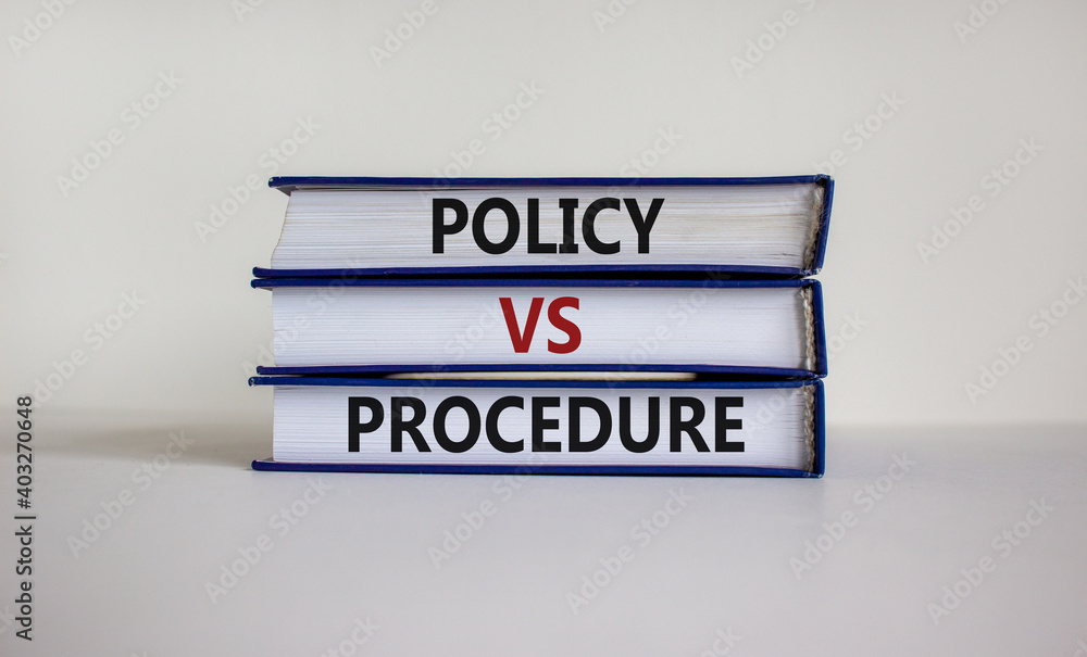 Policy vs procedure symbol. Books with words 'Policy vs procedure' on beautiful white table, white background. Business and policy vs procedure concept, copy space.