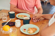 © Monkey Business - Close Up Of Senior Woman Comforting Man Suffering With Depression At Breakfast Table At Home