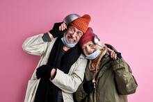 Homeless People Do Not Lose Heart Despite Hunger And Cold, Positive Bums In Dirty Clothes Isolated On Pink Background