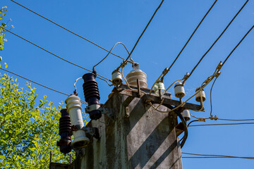 Old rusty working electricity transformer 