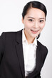 © eastfenceimage - A young business woman in a suit
