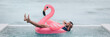 Happy man relaxing in swimming pool flamingo float despite bad rain weather. Travel summer vacation banner