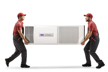 Wall Mural - Workers carrying a self standing portable air conditioning unit