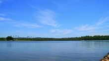 Time-lapse Of Lake View In The Park, Cirrus Clouds In Blue Sky