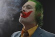 © serikbaib - men in joker mask with cigar