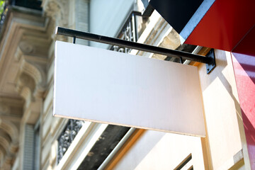 Wall Mural - Blank sign board on a shop wall