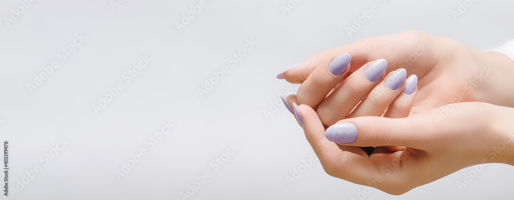 Female hands with rose nail design. Pink glitter nail polish manicure on white background. Nail design copy space. - obrazy, fototapety, plakaty 