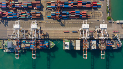 Container ship terminal, and quay crane of container ship at industrial port with shipping container vessel, Maritime cargo freight ship import export business service logistic international 