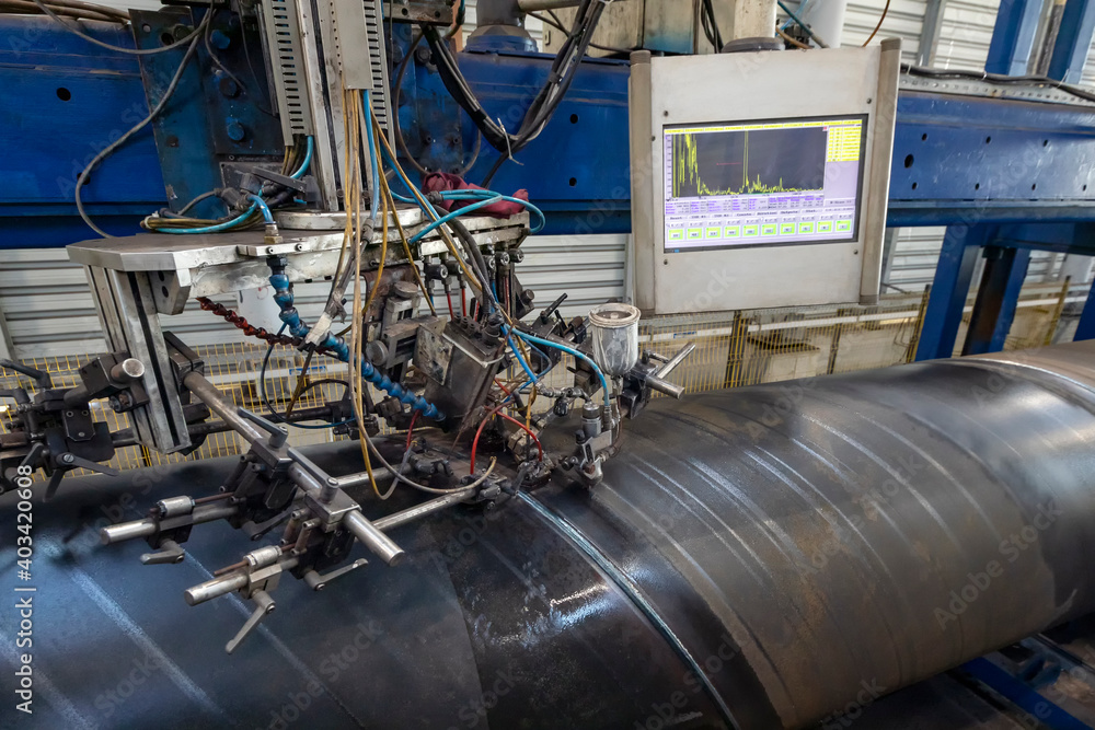Automatic ultrasonic pipe weld inspection. Production of pipes includes ...