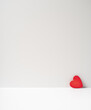 © lmot11 - Red heart on light background. The concept of Valentine's day. Copy space, space for text.