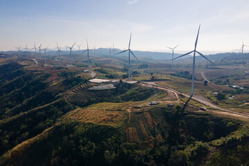 the wind turbines field and the sunrise.