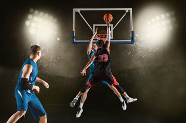 Wall Mural - Two basketball players in action