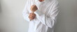 © sittinan - A handsome man in his loft dresses his sexy white shirt
