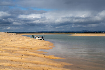 Poster - man collecting sand for crabmeal and fishing in the Ria Formosa River Delta