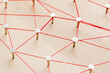 © fusssergei - Nails connected by threads. Abstract concepts of the network, social networks, the Internet, teamwork, communication