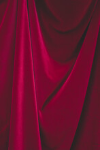 Detail Of Draped Red Velvet Curtain With Folds And Creases