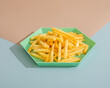 French fries on geometric plate in minimalism style