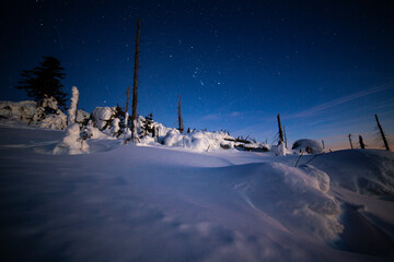 night sky with stars sonw and mountains