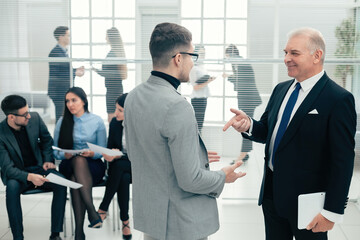 Wall Mural - serious boss explaining something to his assistant