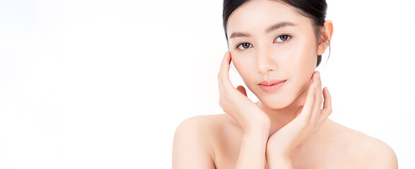 Wall Mural - Closeup portrait of beauty asian woman with fair perfect healthy glow skin hand touching cheek isolated on white, young beautiful asia girl with pretty smile on face. Beauty korean spa skincare banner