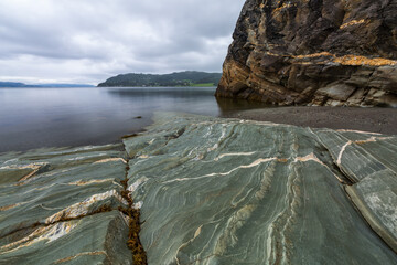 Seascape with beautiful rock on foreground, Norway