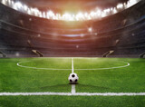 Fototapeta Sport - soccer ball in the stadium