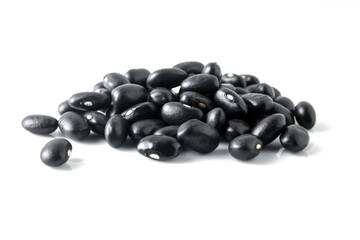 Wall Mural - Black beans isolated on white background.