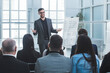© yurolaitsalbert - speaker is pointing at a flip chart during your business presentation