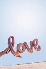 Poster - balloon in the shape of the word love