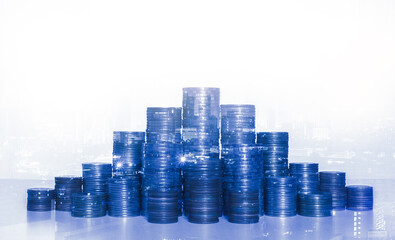 row of coin stack with double exposure night city background for financial banking and saving money and business stock investment concept.