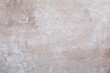 Light brown stone texture background with white dust and stains