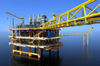 © athitat - Oil rig building and structure tower on the sea.3d rendering.