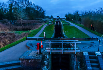 Wall Mural - A view after sunset looking up the incline at the ten locks at Foxton Locks, UK on a winter's day