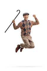 Wall Mural - Full length portrait of an elderly man with a cane jumping and smiling