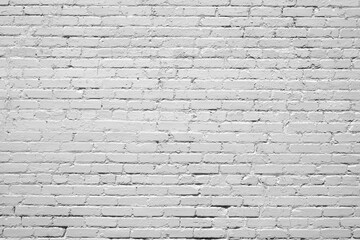 Wall Mural - Black gray brick wall background. Monotone texture of a flat brick wall close-up.