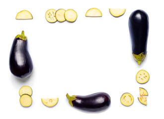 Frame made of fresh and sliced eggplants on white background