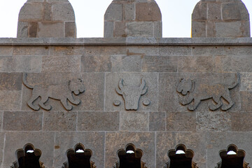 Wall Mural - emblems of old city of Baku. Lion figures on Baku fortress