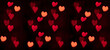 © Corri Seizinger - Hearts abstract background in red pink colors, isolated on black texture - Happy Valentine's Day Banner panorama - Hearts bokeh / Love pattern