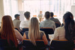 © luckybusiness - Group of business people listening to a lecture at seminar. People, company, job, business concept.