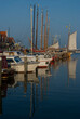 © Arcaid Images - Boats in a harbour, Volendam, The Netherlands.