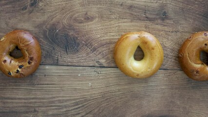 Wall Mural - Grabbing a Bagel from a Variety of Bagels