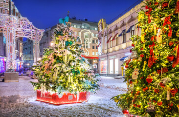 Wall Mural - New Year's multi-colored trees in front of the Central Department Store in Moscow