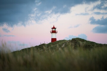 Lighthouse on Sylt island Germany during colorful sunset with clouds no. 1