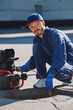 © leo_nik - Plumber prepares to fix the problem in the sewer with portable camera for pipe inspection and other plumbing work.