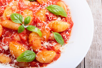 Canvas Print - Italian homemade potatoes gnocchi with tomatoes sauce