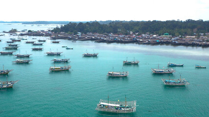 Poster - Aerial shot of many fishing boats near the beach