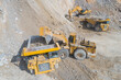 © Cavan Images - mining machinery performing operations from an aerial point of view