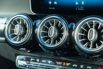 Poster - Closeup shot of a modern car center console panel details