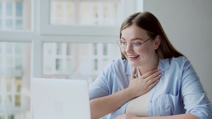 Cheerful woman feeling happy, reading email on laptop, career development